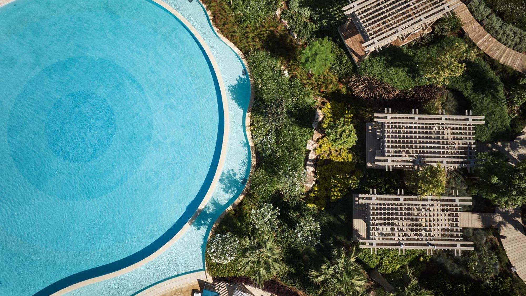 City Of Dreams Mediterranean - Integrated Resort, Casino & Entertainment Лимасол Экстерьер фото Aerial view of the pool